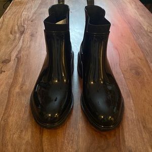 Black shiny rubber boots